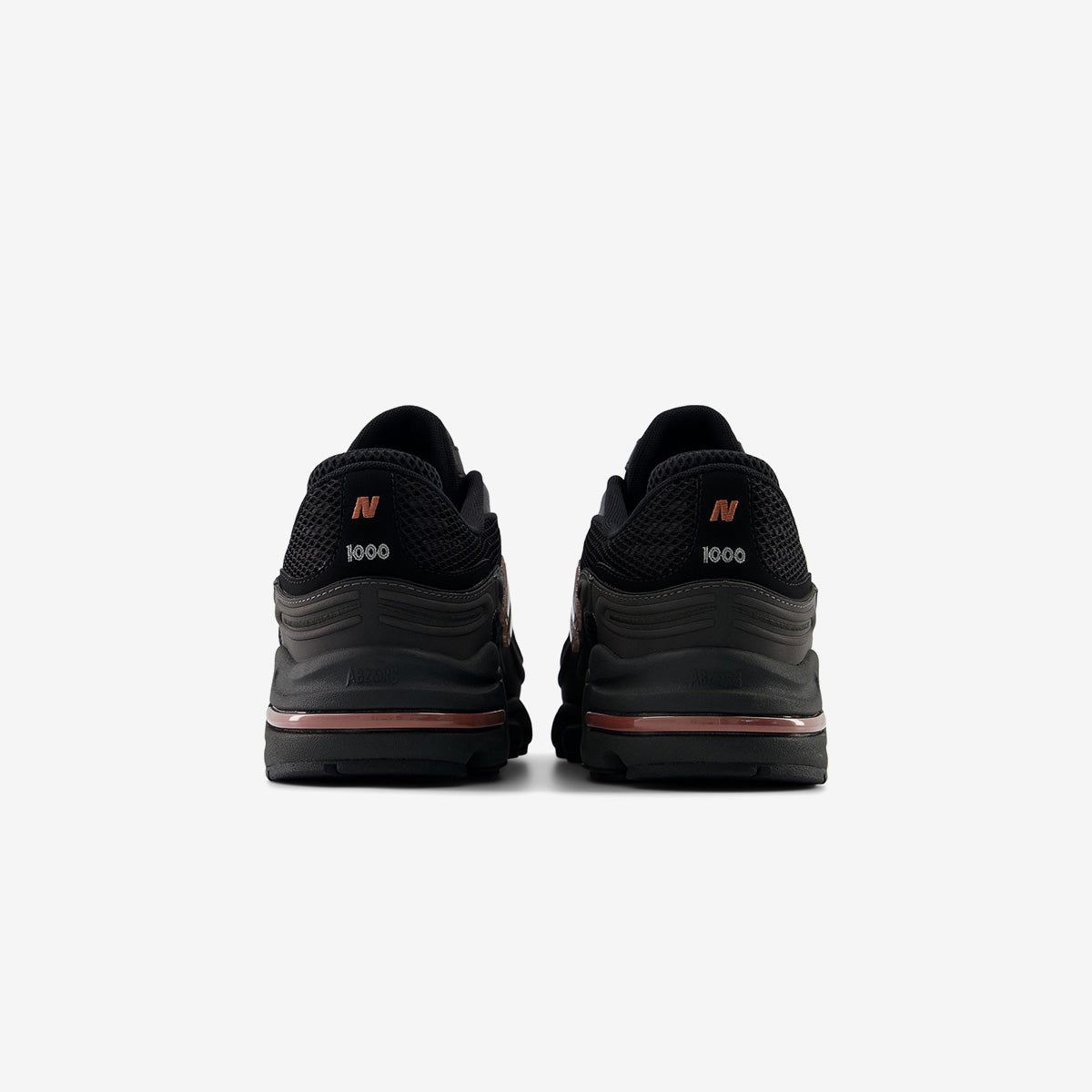 New Balance 100G 'Black Metallic'